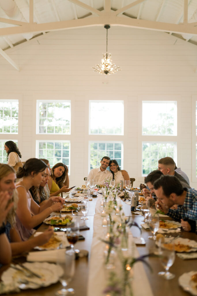 candid moments with family during their South Carolina wedding rehearsal dinner