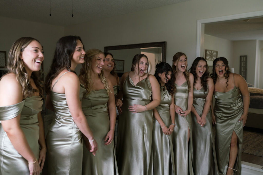 bride and bridesmaids first look