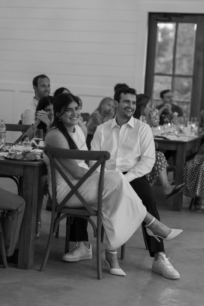 candid moments with family during their South Carolina wedding rehearsal dinner