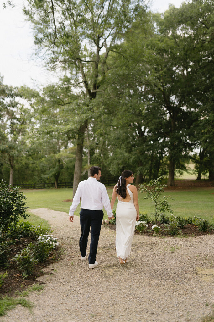 bride and groom wedding rehearsal portraits in greenery