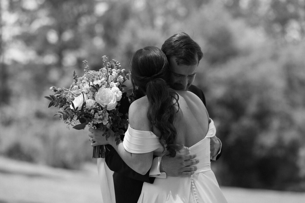 sweet and emotional bride and groom South Carolina wedding first look at Heron Hill property