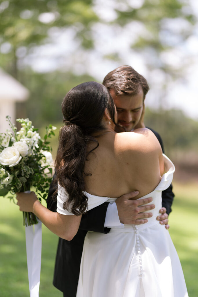 sweet and emotional bride and groom South Carolina wedding first look at Heron Hill property