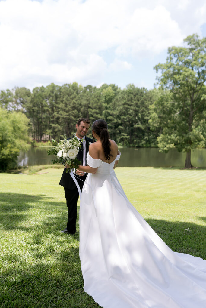 bride and groom emotional first look