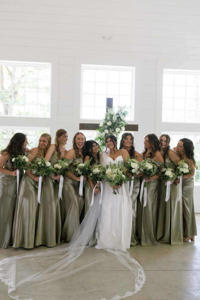 bride and bridesmaids, bridesmaids wearing green silk bridesmaid dresses