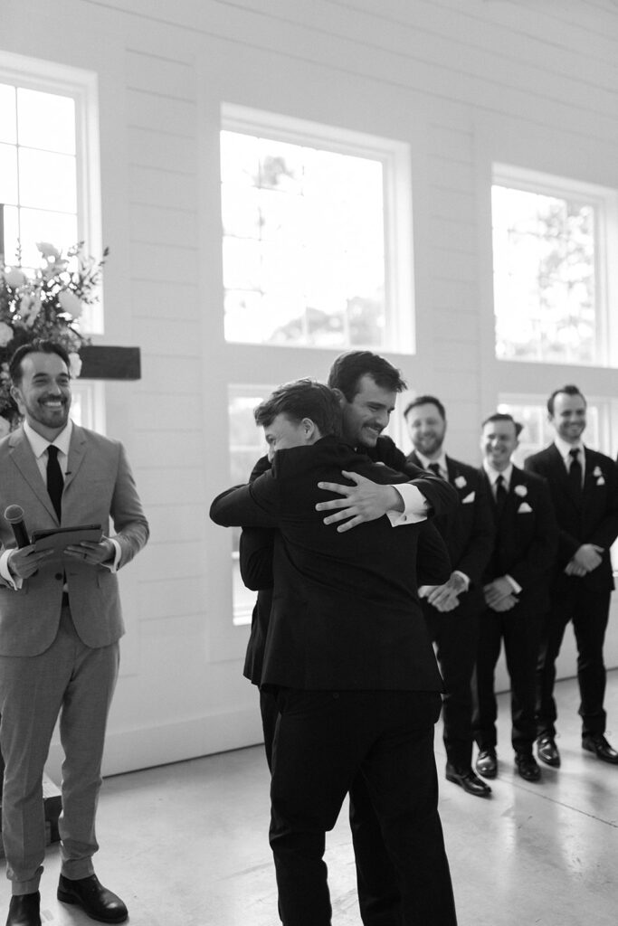 emotional groom at the altar during the ceremony