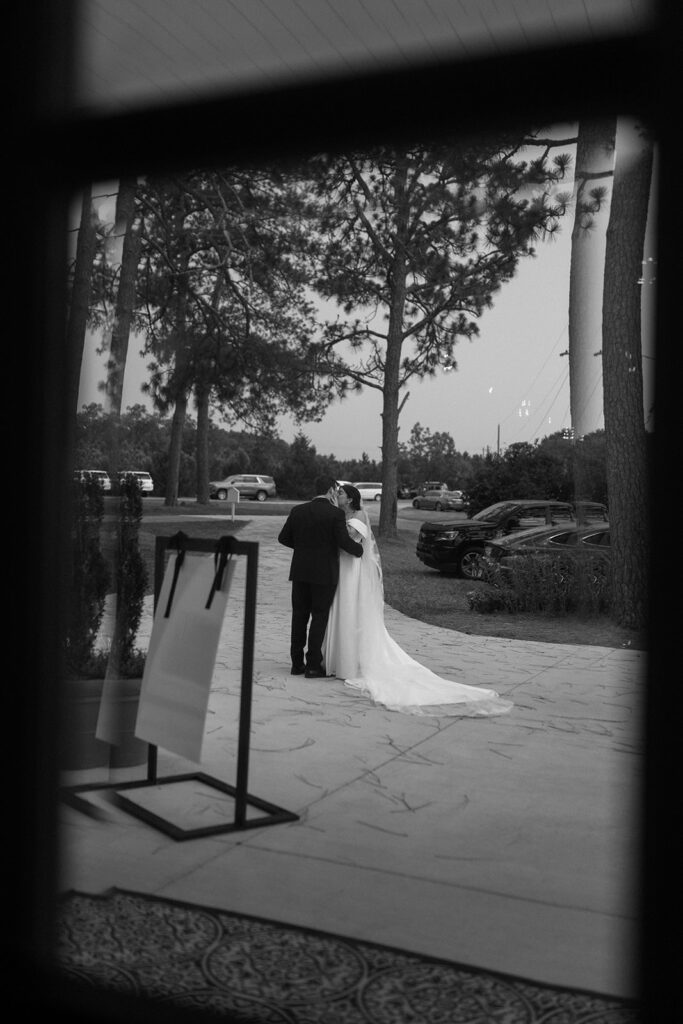 bride and groom walking around the Heron Hill property for their photos